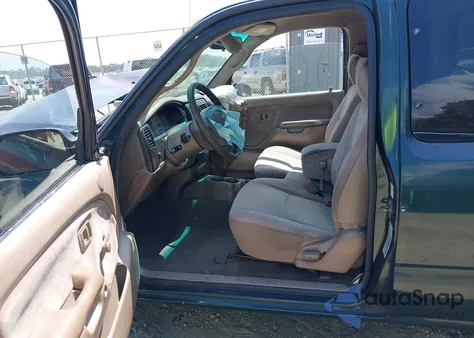 2003 Toyota Tacoma from USA, damaged, VIN 5TEVL52N93Z160188